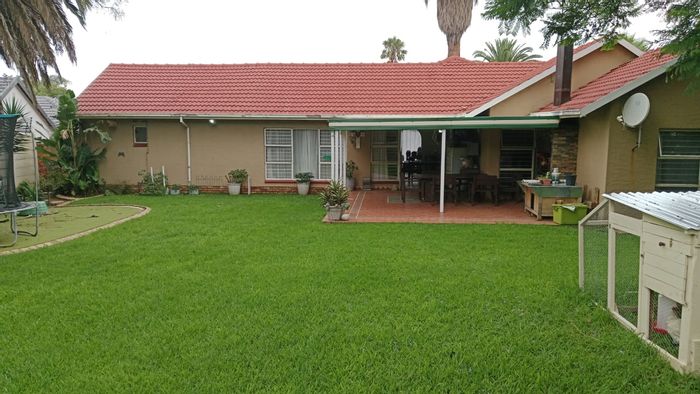 For Sale: 4-Bedroom House in Van Riebeeck Park with Double Garage and Security.