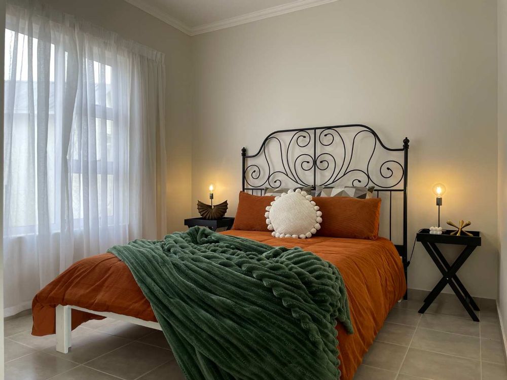 Main bedroom with built-in cupboards.