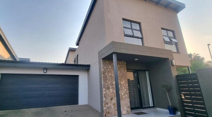 For Sale: Townhouse in Equestria with 24h security, 3 beds, patio, and garages.