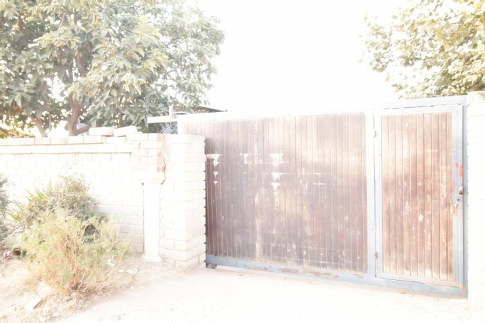 House for Sale in Cosmo City: 2 Bedrooms, Yard, Rental Potential, Close to Amenities.