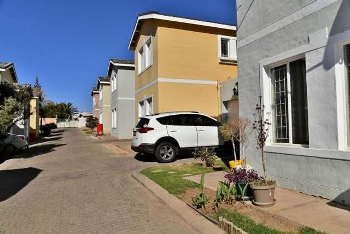 For Sale: 3-Bedroom Townhouse in Avis with private courtyard and garage.