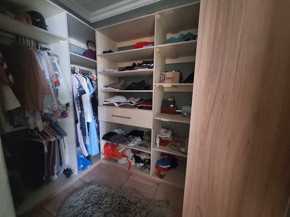 Main bedroom walk-in cupboards