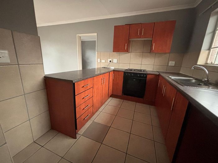 For Sale: Townhouse in Forest Hill with secure parking and private outdoor space.