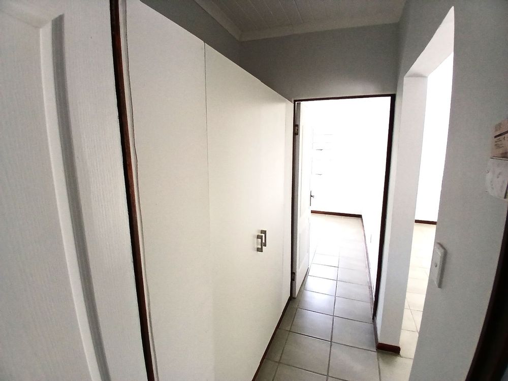 Passage (with lots of built-in cupboards - in between Main Bedroom & 2nd Bedroom.