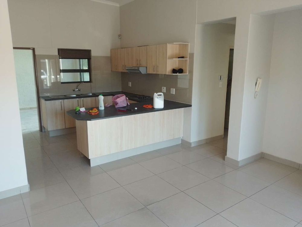 View of the kitchen as seen from the living room area. 