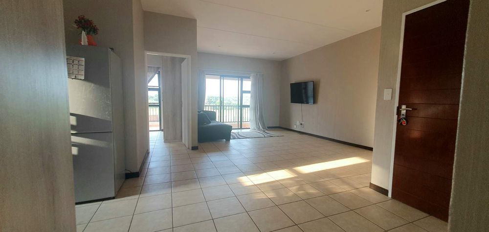 Open plan kitchen and lounge area view