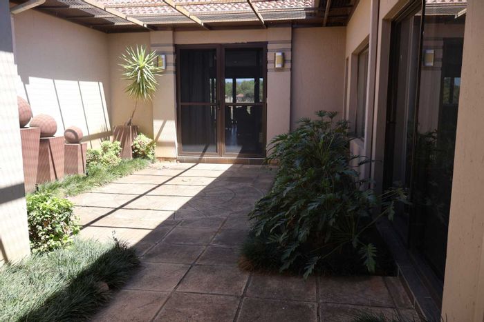 House For Sale in Hartbeespoort Central: 4 Bedrooms, spa pool, security features.