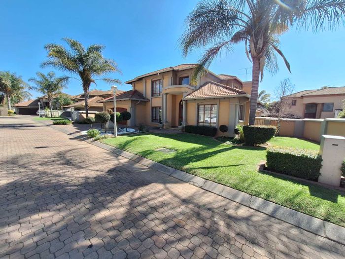 For Sale: Lakefield Cluster with guest suite, double garage, and private garden.