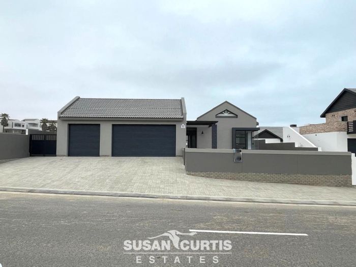 For Sale: House in Mile 4 Ext 1 with BBQ, double garage, and security features.
