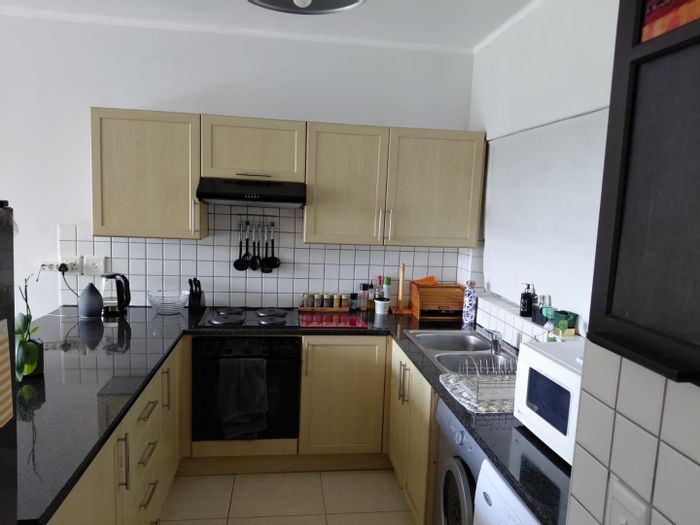 Furnished 2-bedroom apartment with security, balcony, and convenient location in Tygerfalls.
