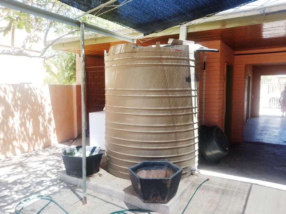 General view of more water tanks collecting rain water. 