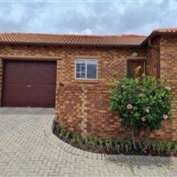 For Sale: Rooihuiskraal Townhouse with 2 Bedrooms, Double Garage, and Private Garden.