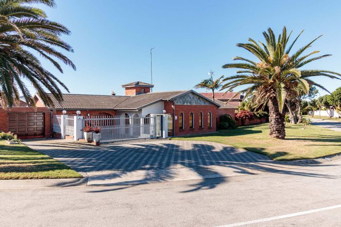 For Sale: Bluewater Bay House with pool, guest suite, and energy-efficient features.