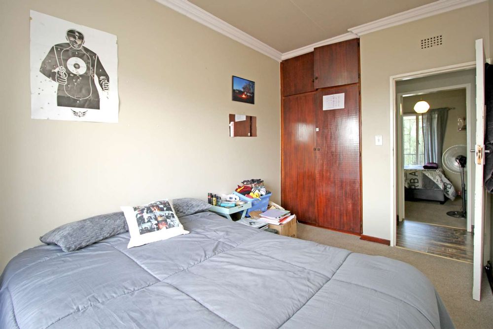 FAMILY BEDROOM No. 2 IN THE UPSTAIRS LIVING QUARTERS OF THE TOWNHOUSE