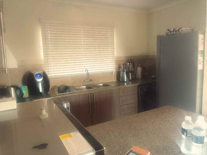 For Sale: Apartment in Mooikloof Ridge with spacious living areas and essential amenities.