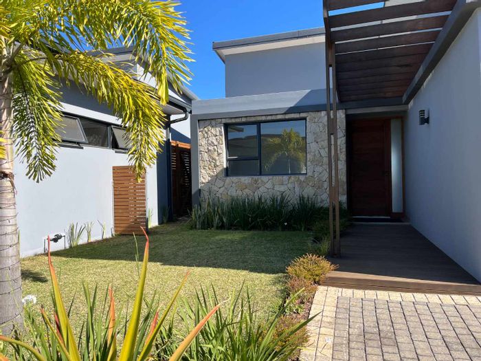 To Rent: 3-Bedroom Townhouse in Salt Rock Central with garden and double garage.