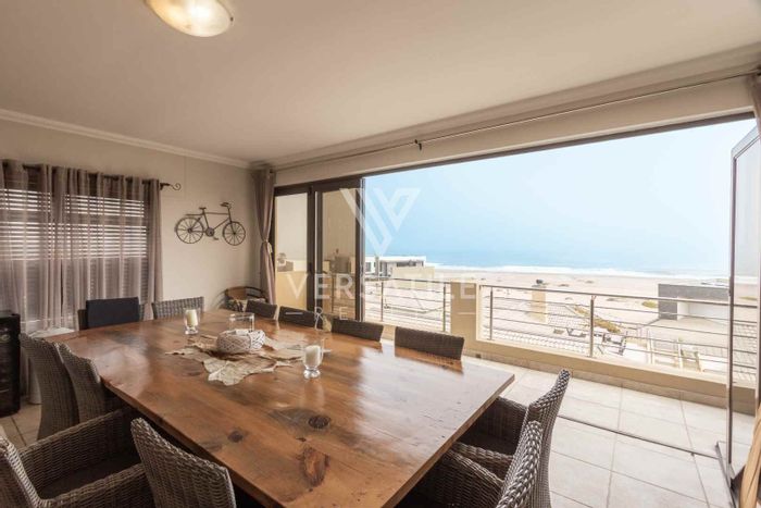 For Sale: Dolphin Beach Townhouse with 3 Bedrooms, Indoor BBQ, and Sea View.