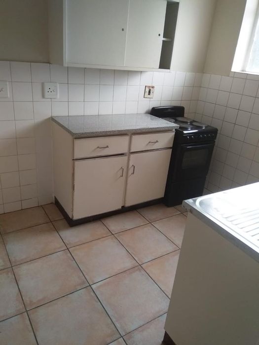 For Sale: 2-Bedroom Apartment in Pretoria West with Covered Parking and Investment Potential.