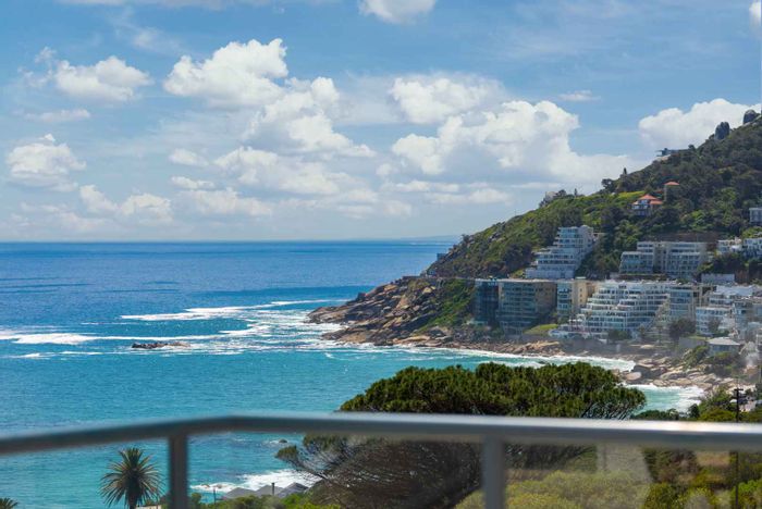 Camps Bay Apartment For Sale: 3 bedrooms, ocean views, two balconies, parking bays.