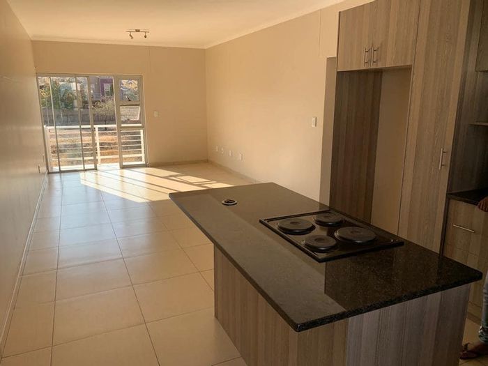 Elisenheim 1st Floor Apartment: 2 Bedrooms, Open Plan Kitchen, Balcony, Basement Parking