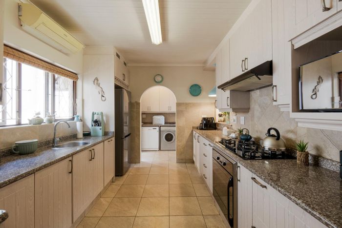 Amanzimtoti House For Sale: Spacious 4-bed home with pool, solar, and entertainment area.