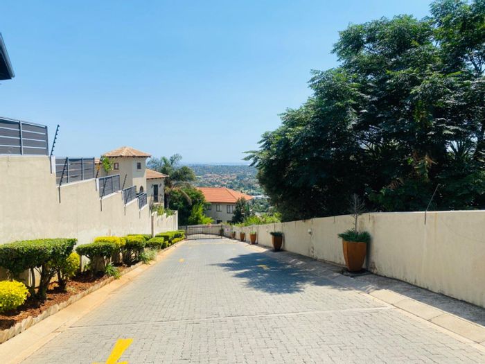 3-Bedroom Apartment To Rent in Constantia Kloof with patio and covered parking.