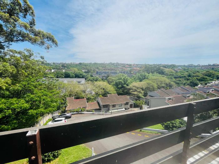 Umgeni Park Townhouse For Sale: Duplex with valley views, garage, and pet-friendly complex.