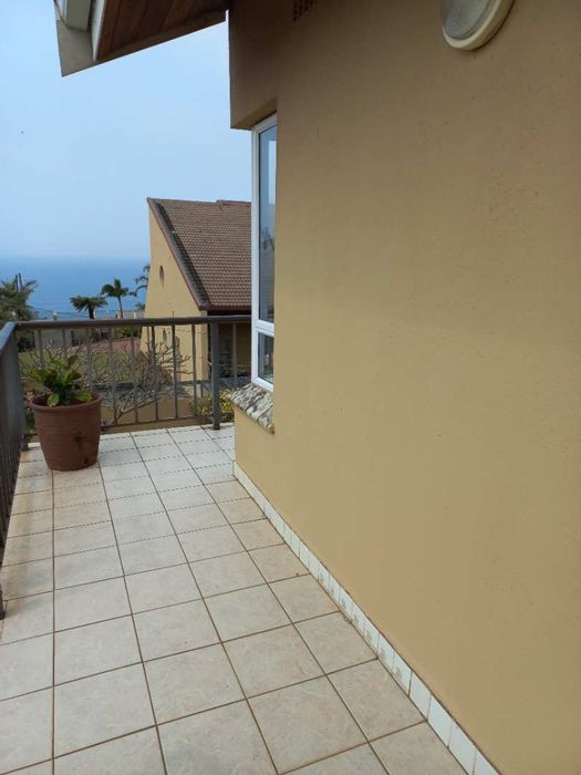 3-Bedroom House To Rent in Desainagar Central with balcony, parking, and sea views.