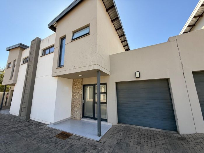 Townhouse For Sale in Equestria: 2 beds, pet-friendly garden, secure estate living.
