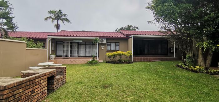 For Sale: Townhouse in Southbroom Central with garden, braai area, and parking.