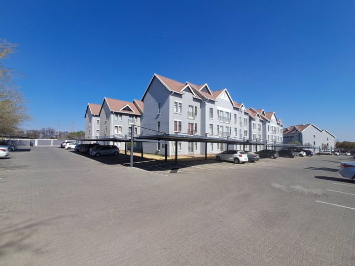 2-Bedroom Apartment in Kosmosdal For Sale with Ensuite, Balcony, and Carport.