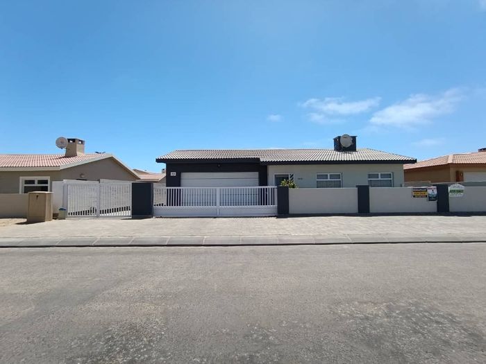 For Sale: House in Swakopmund Ext 9 with indoor BBQ, double garage, and courtyard.