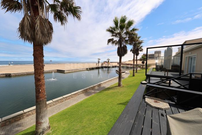 For Sale: Long Beach Townhouse with 3 beds, 3 baths, ocean views, and BBQ area.