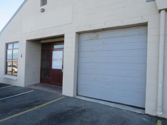 Industrial unit to rent in Ottery with secure parking and roller door access.