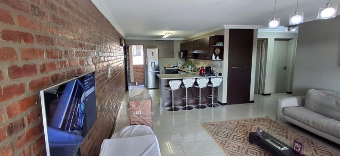 2-Bedroom Apartment For Sale in Solheim with pool, gym, and park access.