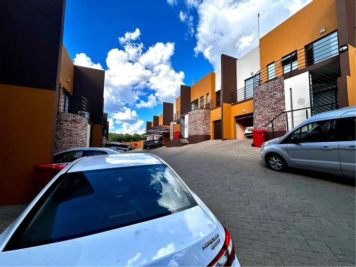 For Sale: Rocky Crest Townhouse with 3 bedrooms, garage, and outdoor braai area.