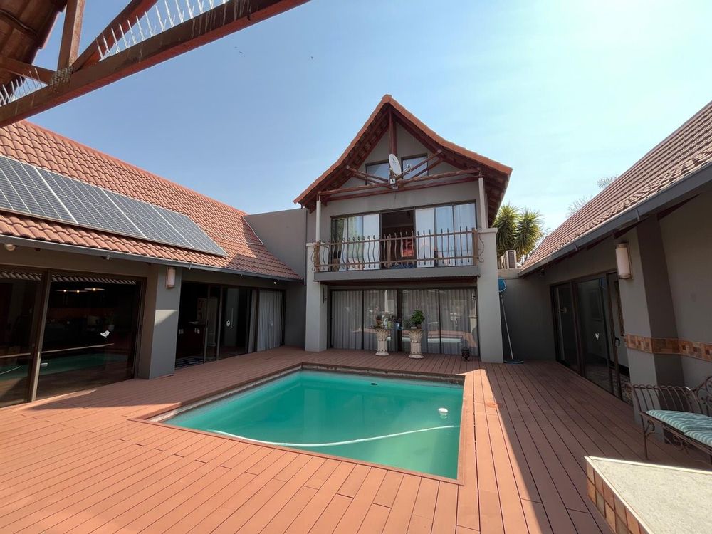 Swimming pool in center of home.