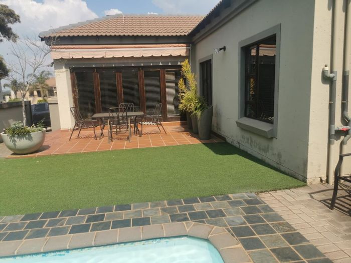 For Sale: House in Midstream Estate with pool, garage, and secure living.