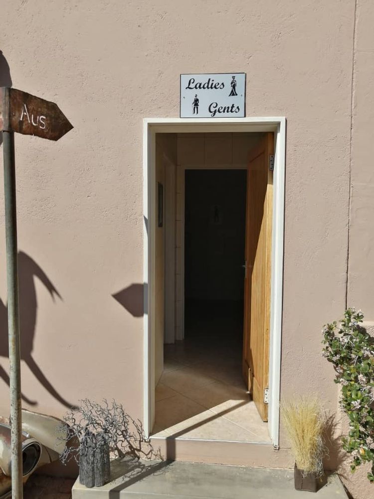 BAHNHOF HOTEL BEER GARDEN AND BATHROOM AREA