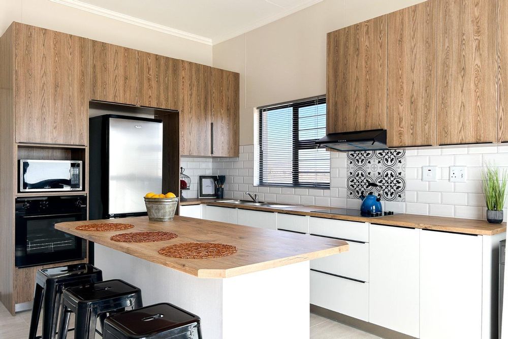 Modern kitchen with sleek kitchen island.