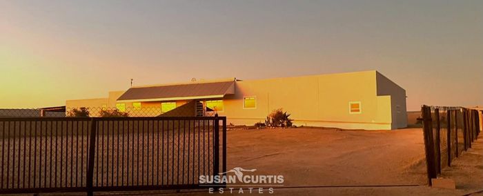 Swakopmund River Plots: For Sale Small Holding with Dual Residences and Ample Garages.