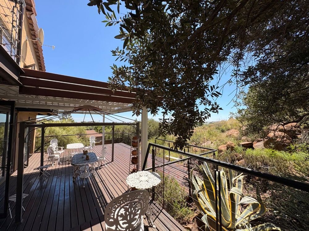 Covered patio overlooking the green belt.