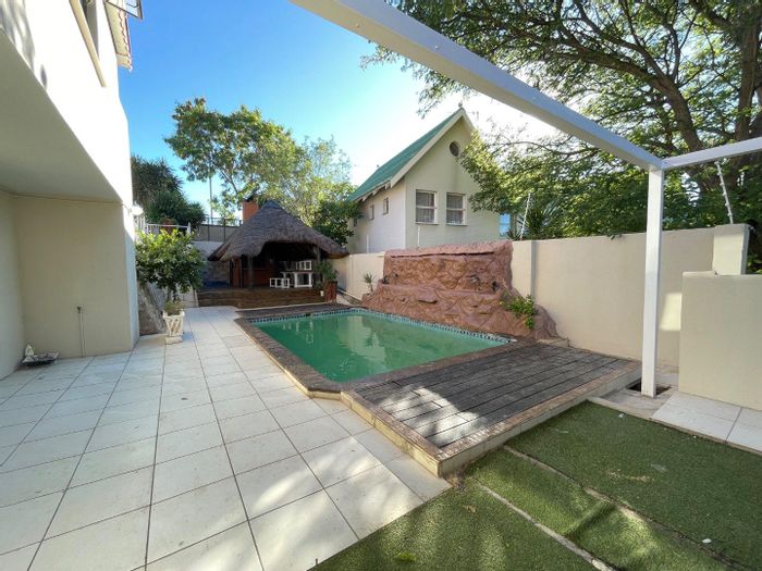 For Sale: House in Ludwigsdorf with pool, garage, and security features.