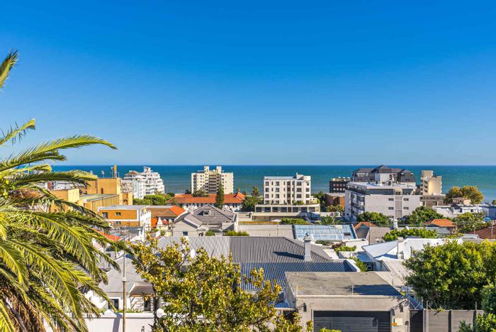 Sea Point Apartment For Sale: Ocean views, garage, easy access to amenities.