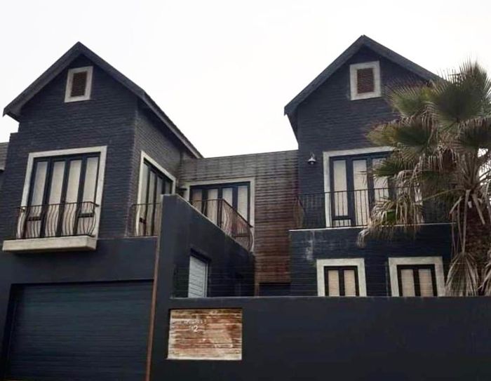 For Sale: House in Mile 4 with pool, entertainment area, and double garage.