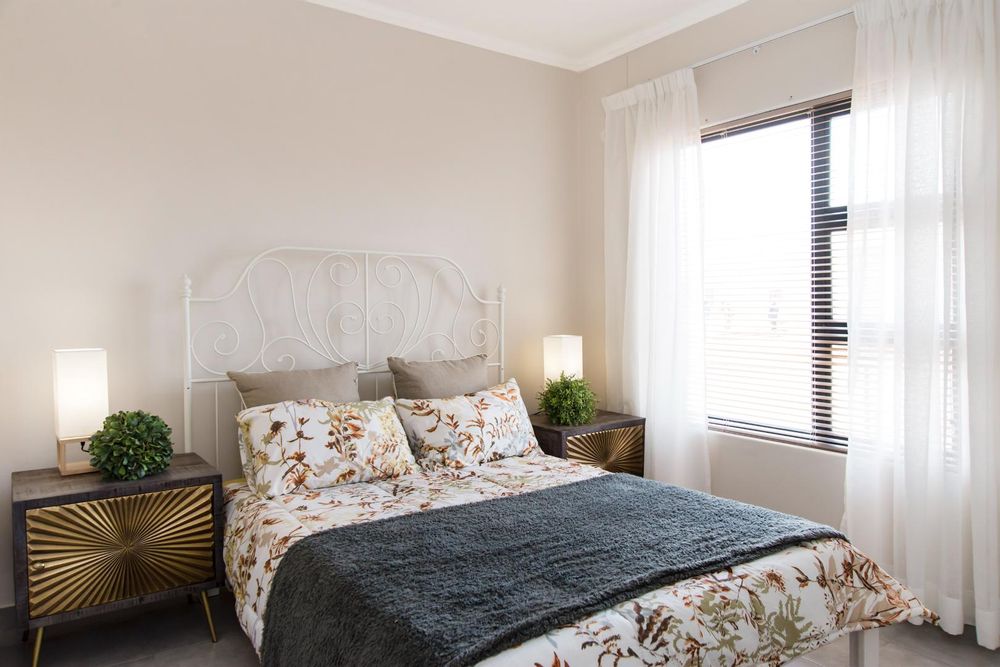 Third bedroom with built-in cupboards.