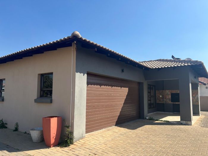 For Sale: House in The Orchards with 3 beds, double garage, and braai area.