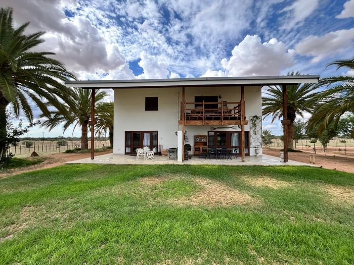 Farm for Sale in Wilhelmstal Central: 8-bedroom lodge, guest villas, runway, game-rich land.