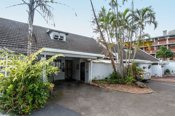 For Sale: 3-Bedroom Townhouse in Umhlanga Central, steps from the beach.