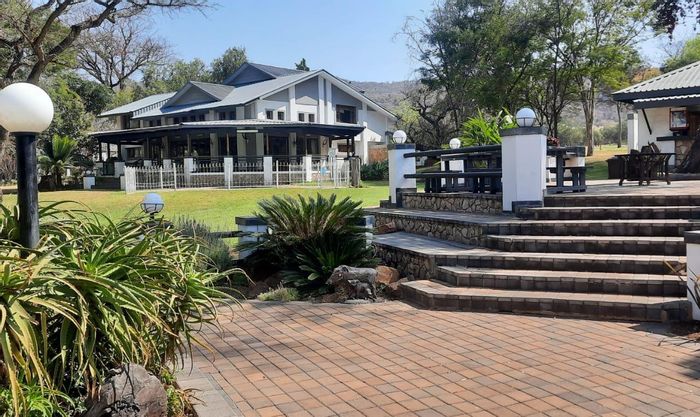 Farm for Sale in Brits Rural: Game lodge, wildlife, accommodations, event venues, expansive land.